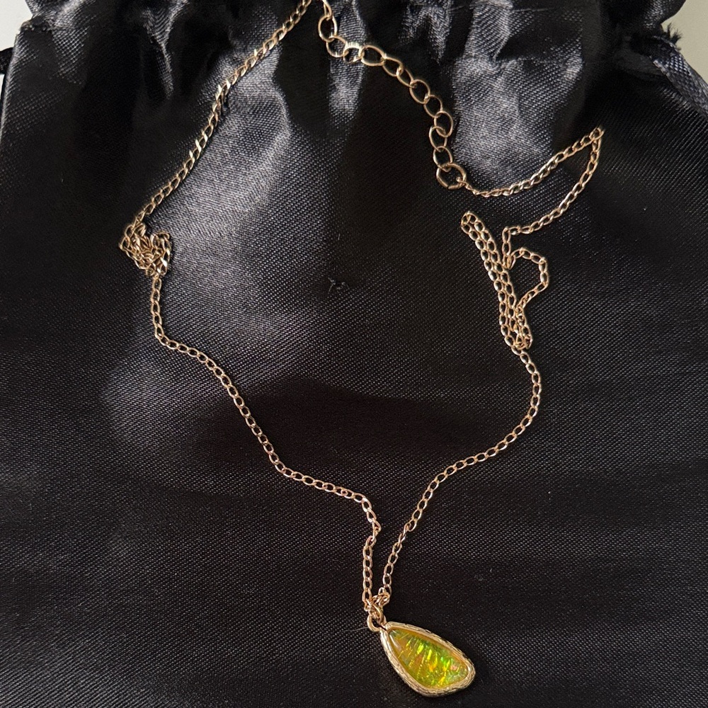 Elegant Gold Necklace with Green Pendant